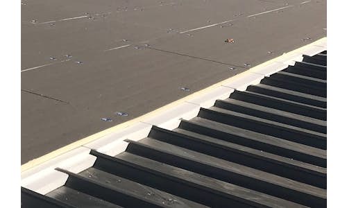 Flute Fill in a metal re-roofing application