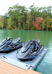 Jetski launches on a lake-side deck