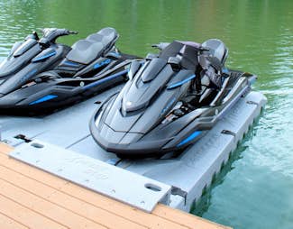 Jetski launches on a lake-side deck
