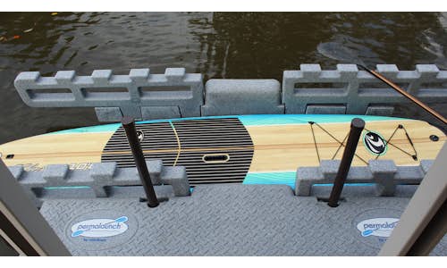 Photo of a Permalaunch kayak dock with a stand-up paddleboard