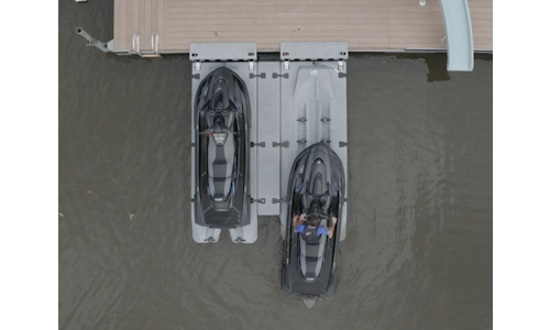 Top view photo of two Permaport Xpress drive-on PWC docks mounted side-by-side with PWC driving on
